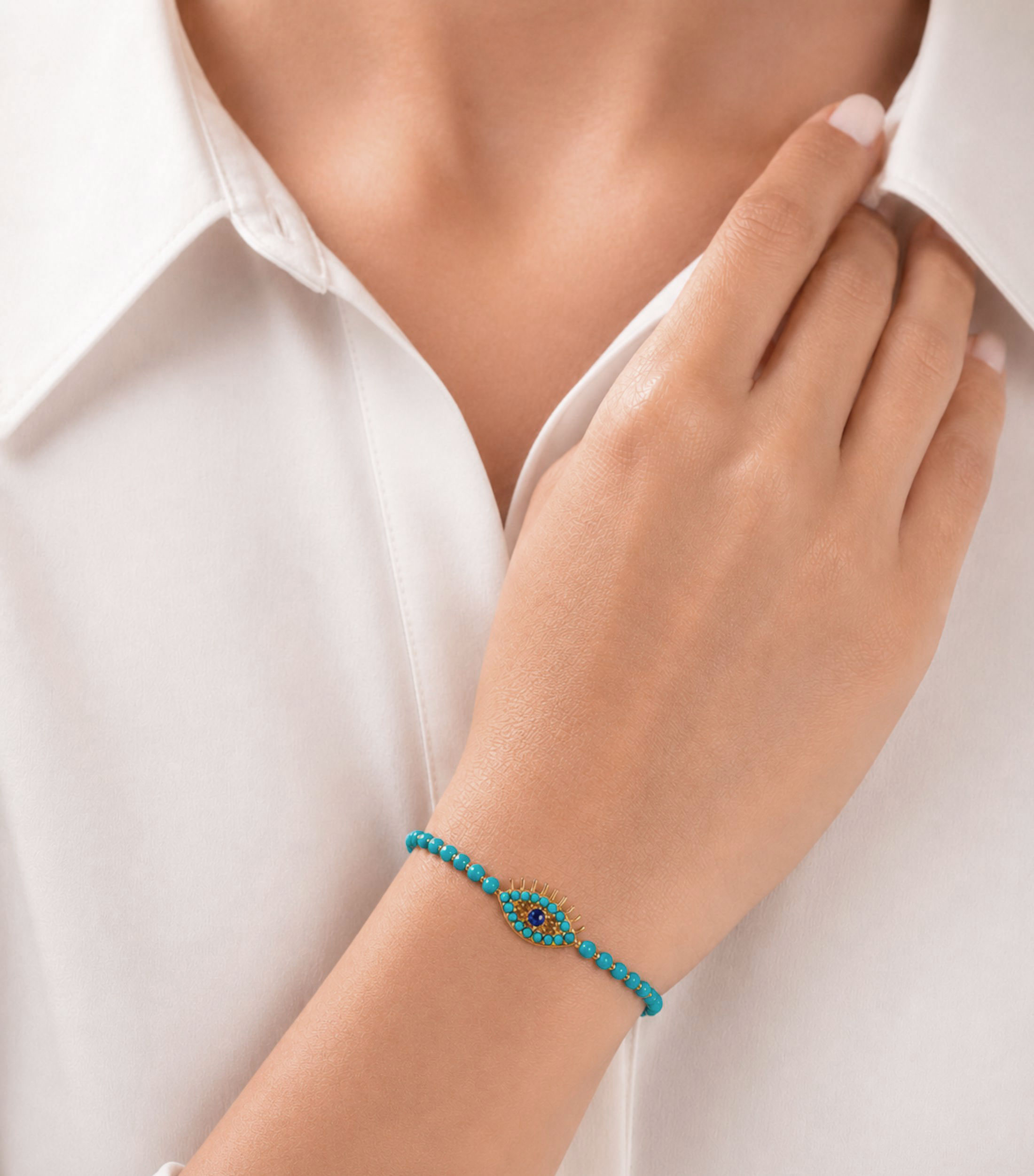 Pulsera turquesa con cuentas esféricas y dije de ojo turco calado Mujer